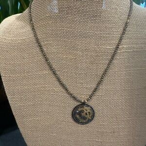 Elegant Gold and Black Necklace with pave diamond pendant